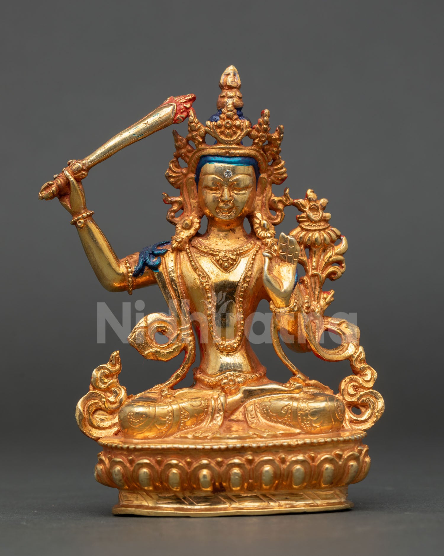 handcrafted 24k gold fire gilded manjushri statue on lotus seat