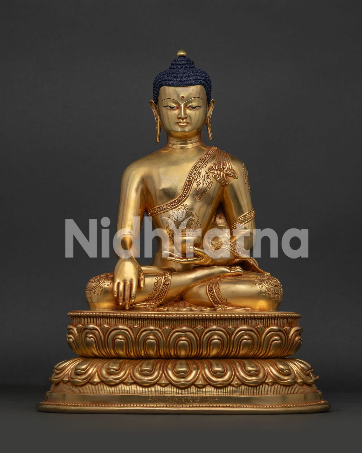 Handcrafted 24K gold fire-gilded Shakyamuni Buddha statue on double lotus pedestal, front view.