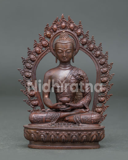 Handcrafted Amitabha Buddha statue from Nepal with oxidized copper finish seated on lotus pedestal