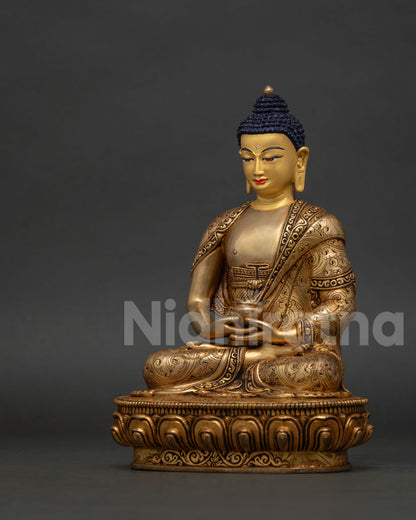 Handcrafted Amitabha Buddha statue from Patan Nepal with 24K gold painted face.