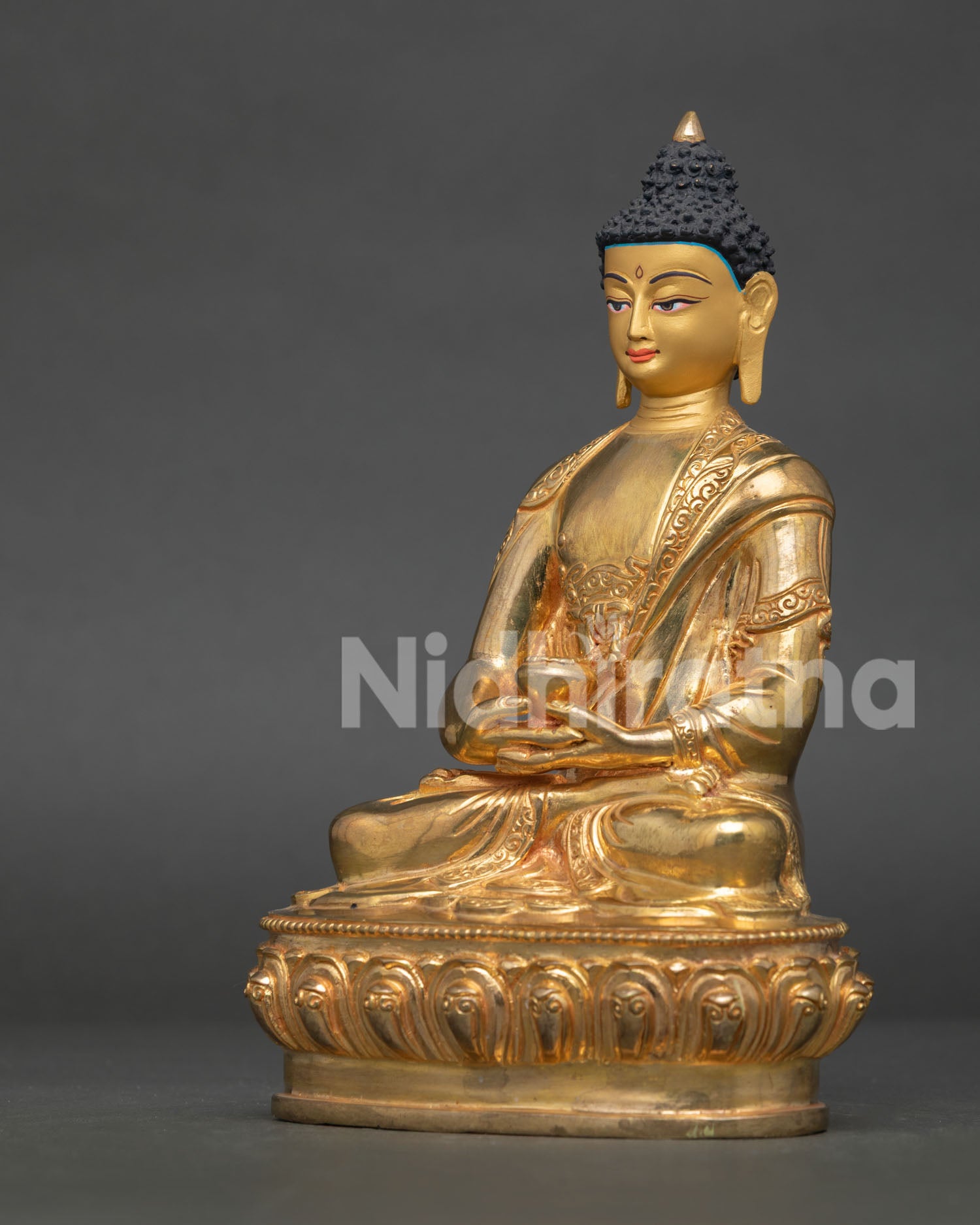 Handcrafted amitabha buddha statue with gold gilded copper body from patan nepal.
