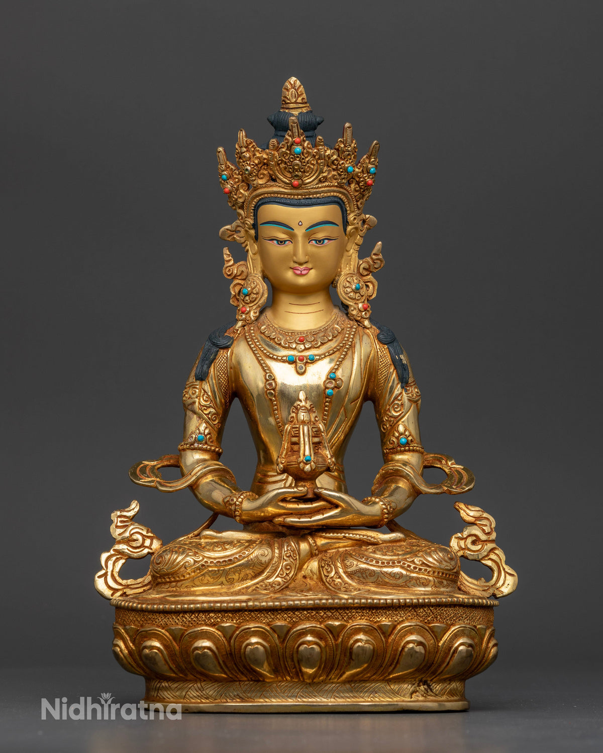 Handcrafted Amitayus Buddha statue from Nepal seated on a carved lotus pedestal.