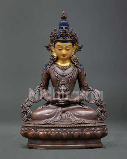 Handcrafted Amitayus Statue from Patan Nepal with oxidized copper finish and gold painted face.