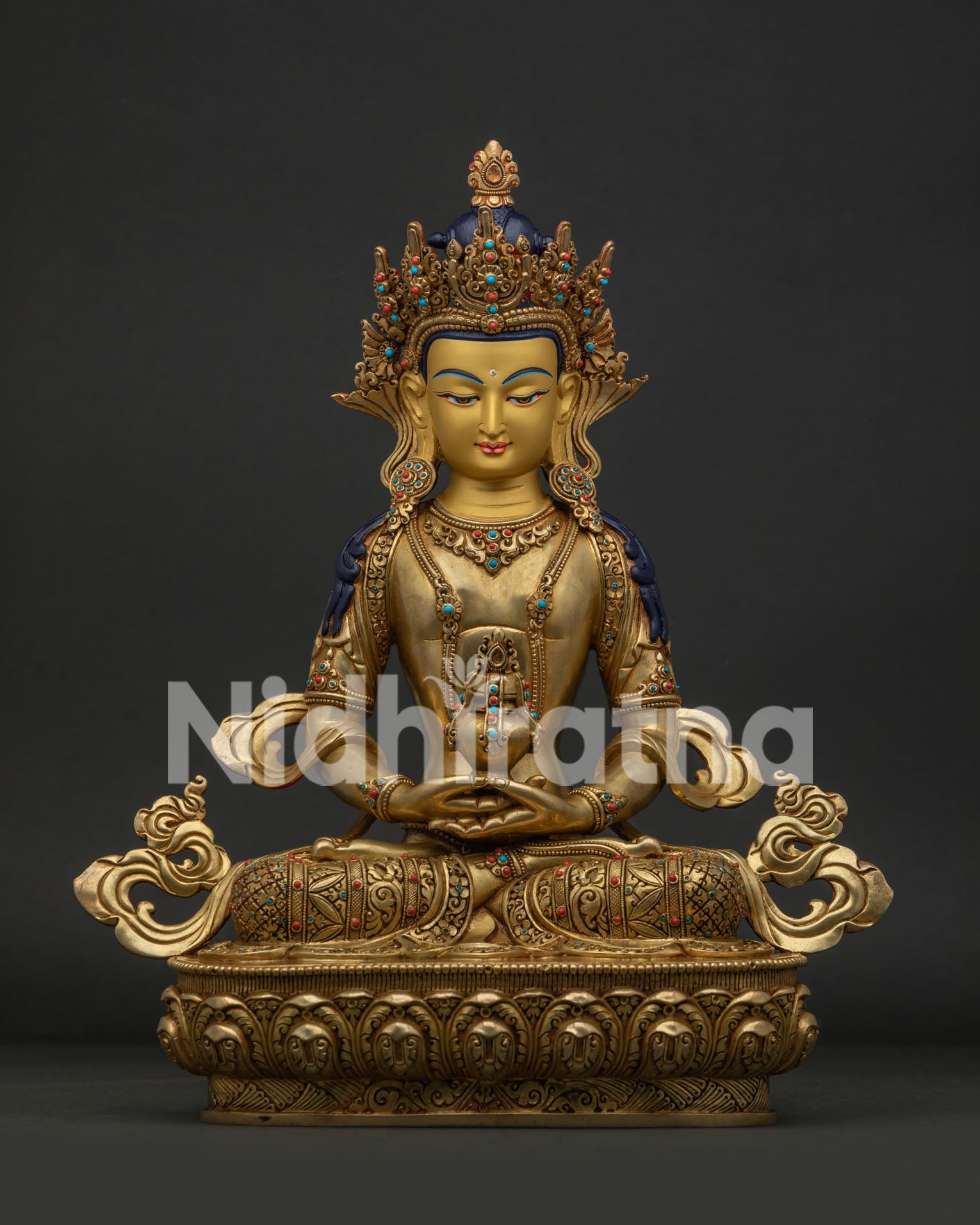 Handcrafted Amitayus Statue in 24K gold fire gilded copper from Patan, Nepal.