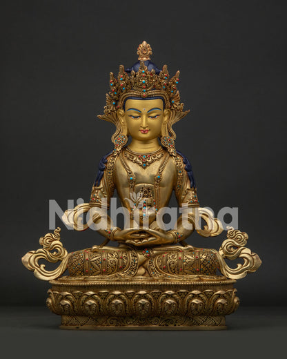Handcrafted Amitayus Statue in 24K gold fire gilded copper from Patan, Nepal.