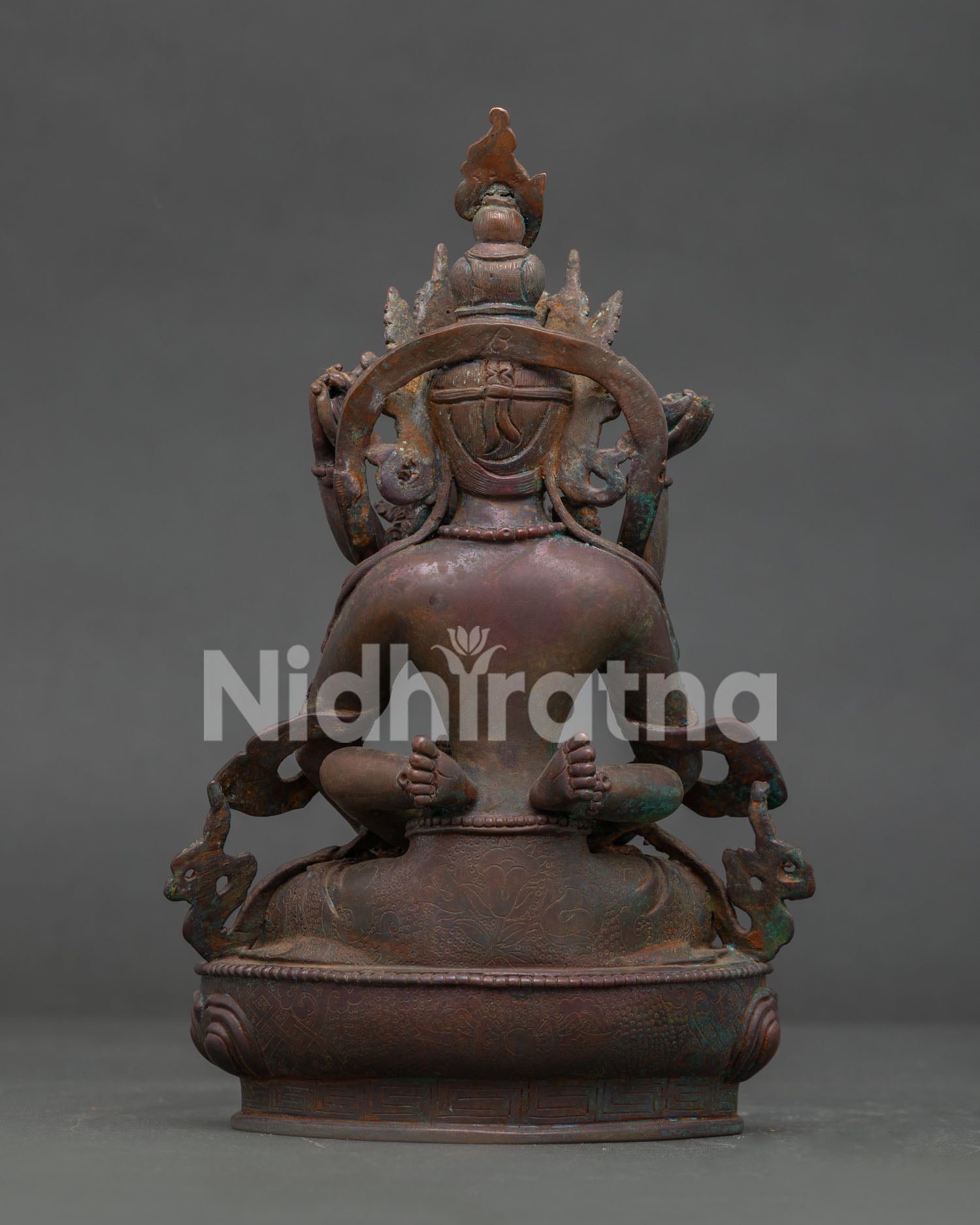 Handcrafted Amitayus with consort statue showing antique oxidized copper finish and details.