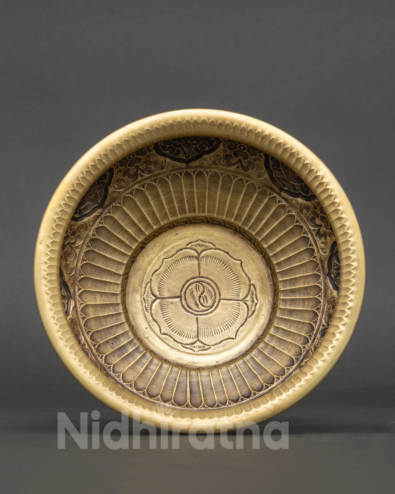 Handcrafted Buddhist altar vessel with lotus flower engraving at center