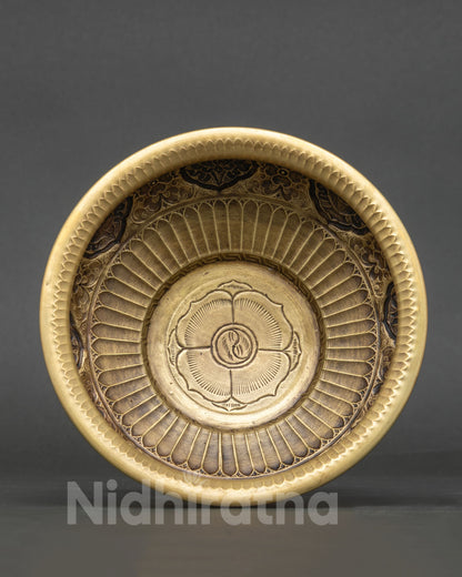Handcrafted Buddhist altar vessel with lotus flower engraving at center
