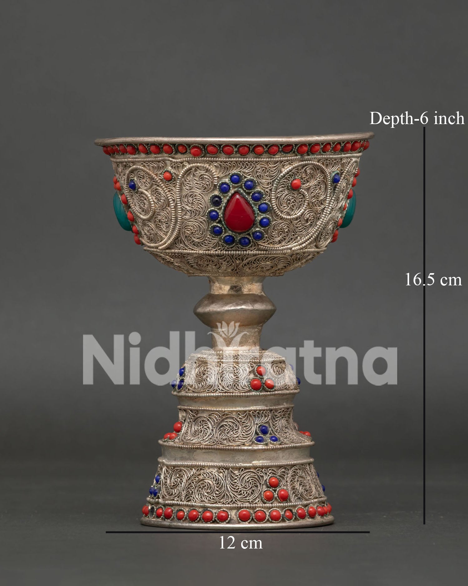 Handcrafted Buddhist butter lamp from Nepal with silver-plated finish and gemstone details