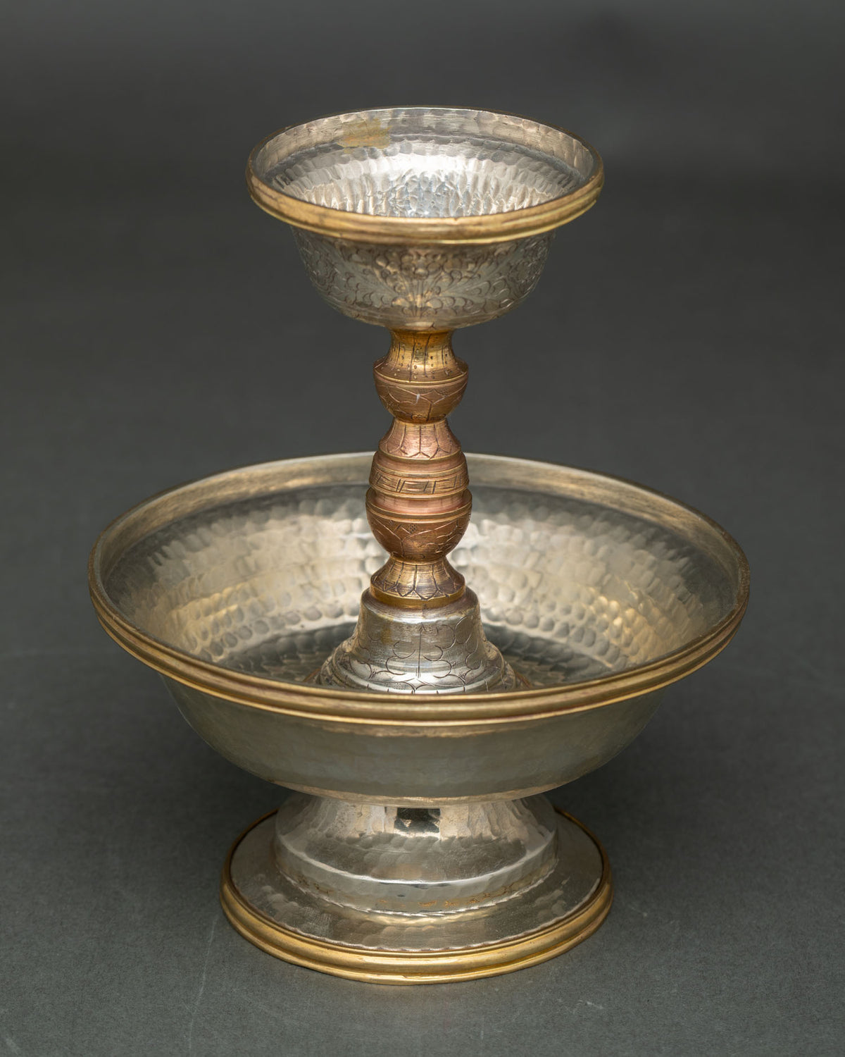Handcrafted Buddhist Offering Bowl showcasing traditional Himalayan metalworking artistry