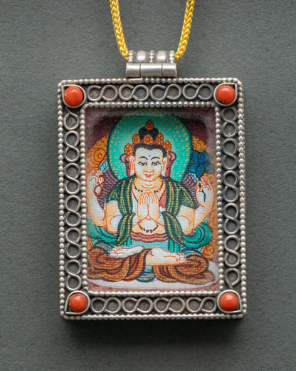 Handcrafted Chenrezig locket from nepal with silver filigree and sacred buddhist art.