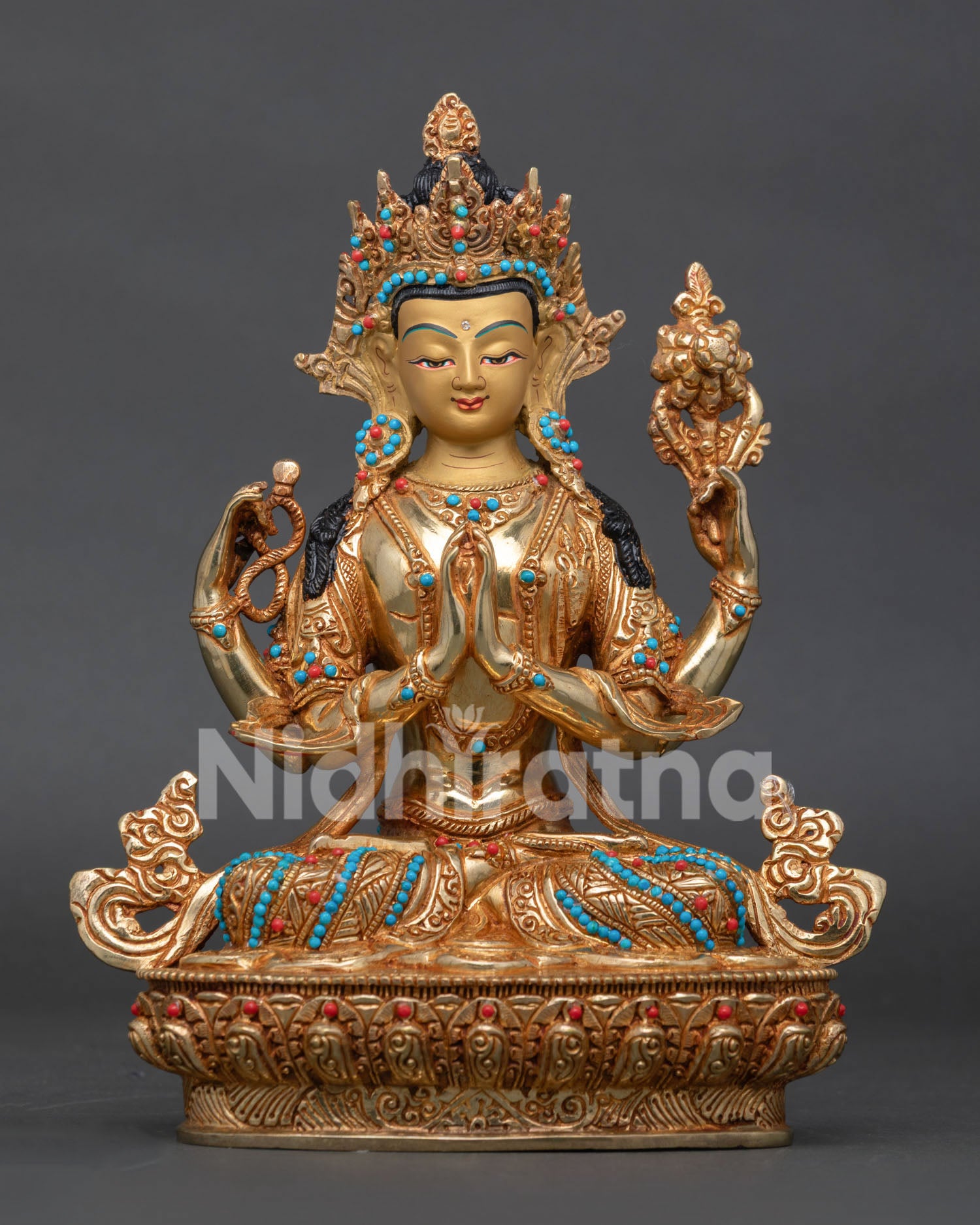 Handcrafted Chenrezig statue with a gold-gilded copper body from Patan, Nepal.