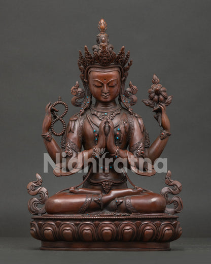 Handcrafted Chenrezig statue with oxidized copper finish and semi precious stone details