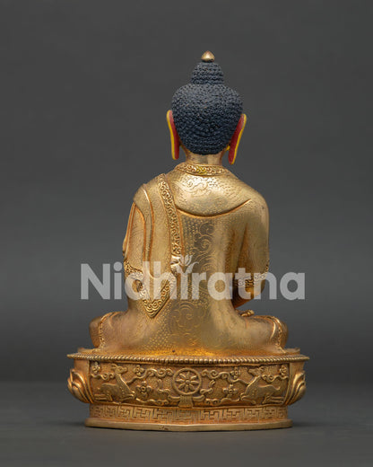 Handcrafted copper Amitabha Buddha statue with Dharma Wheel and deer engraved pedestal.