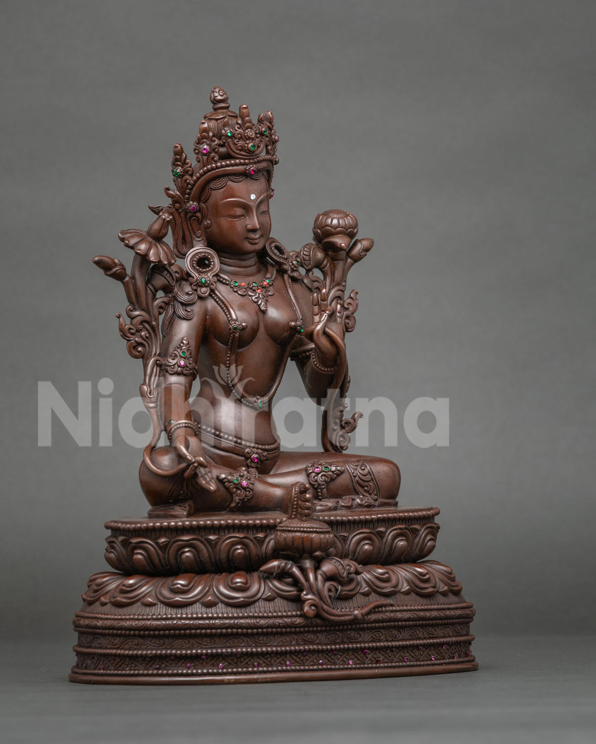 Handcrafted copper Green Tara statue seated on double lotus throne