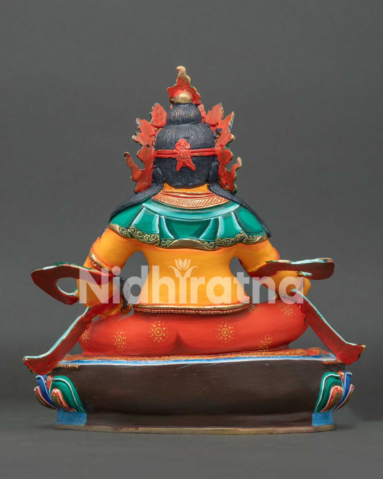 Handcrafted Dzambhala statue back view showing traditional Himalayan Newari metal craftsmanship