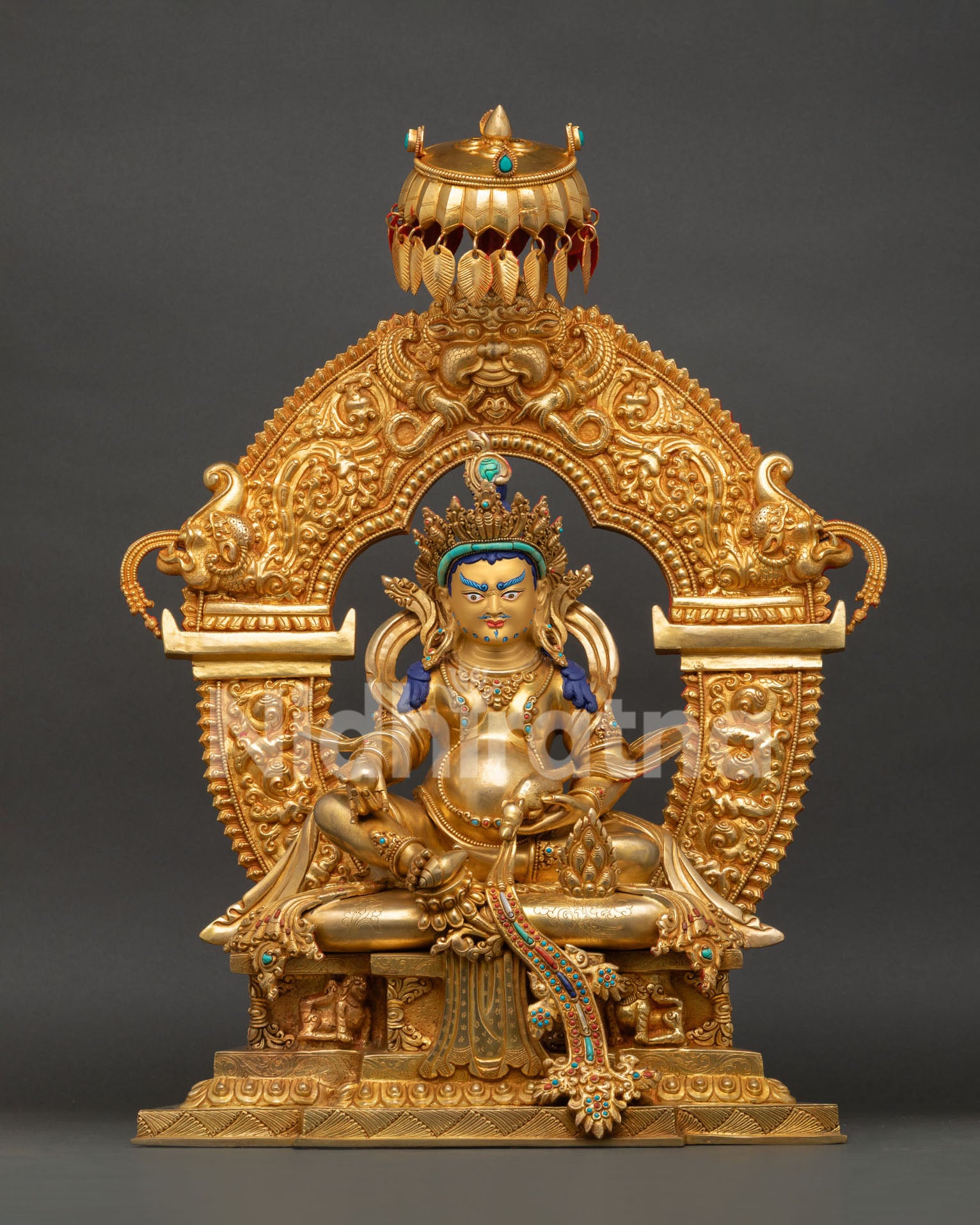 Handcrafted Dzambhala Statue from Nepal with 24K gold gilding, ornate halo, jeweled throne, and sacred Buddhist details