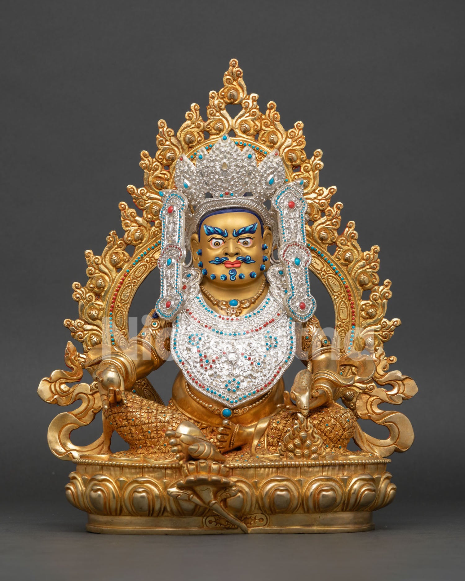 Handcrafted Dzambhala Statue from Nepal with 24K gold gilding, silver details, turquoise stones, and coral adornments