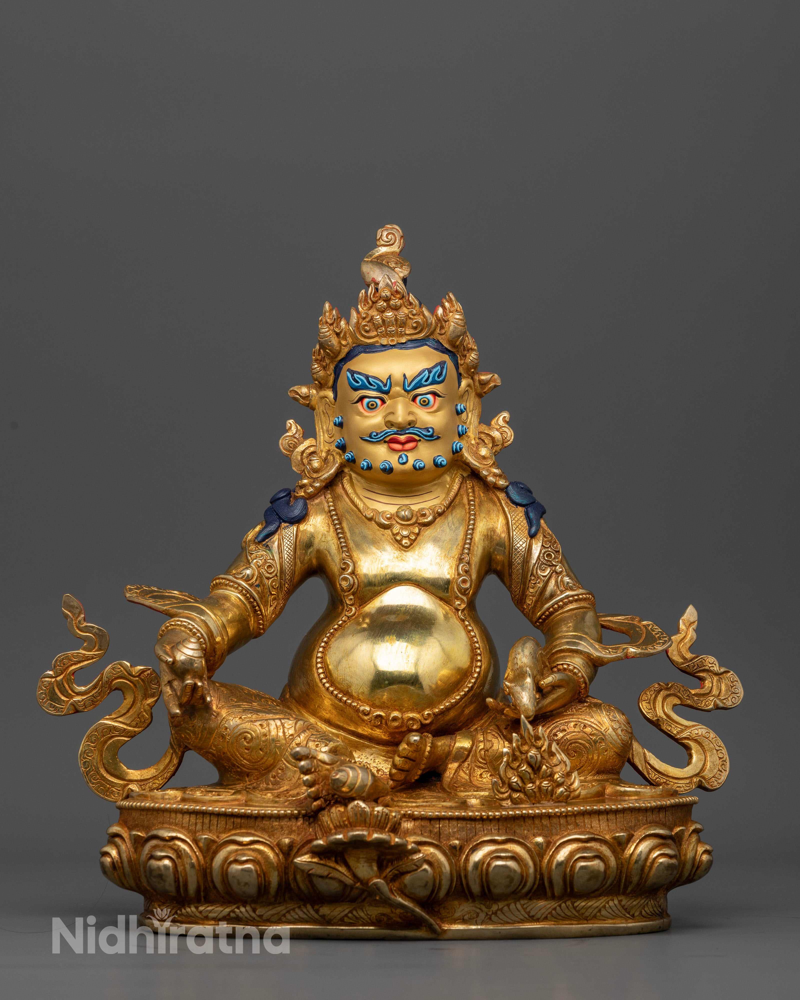 Handcrafted Dzambhala statue gold fire gilded copper from Patan Nepal.