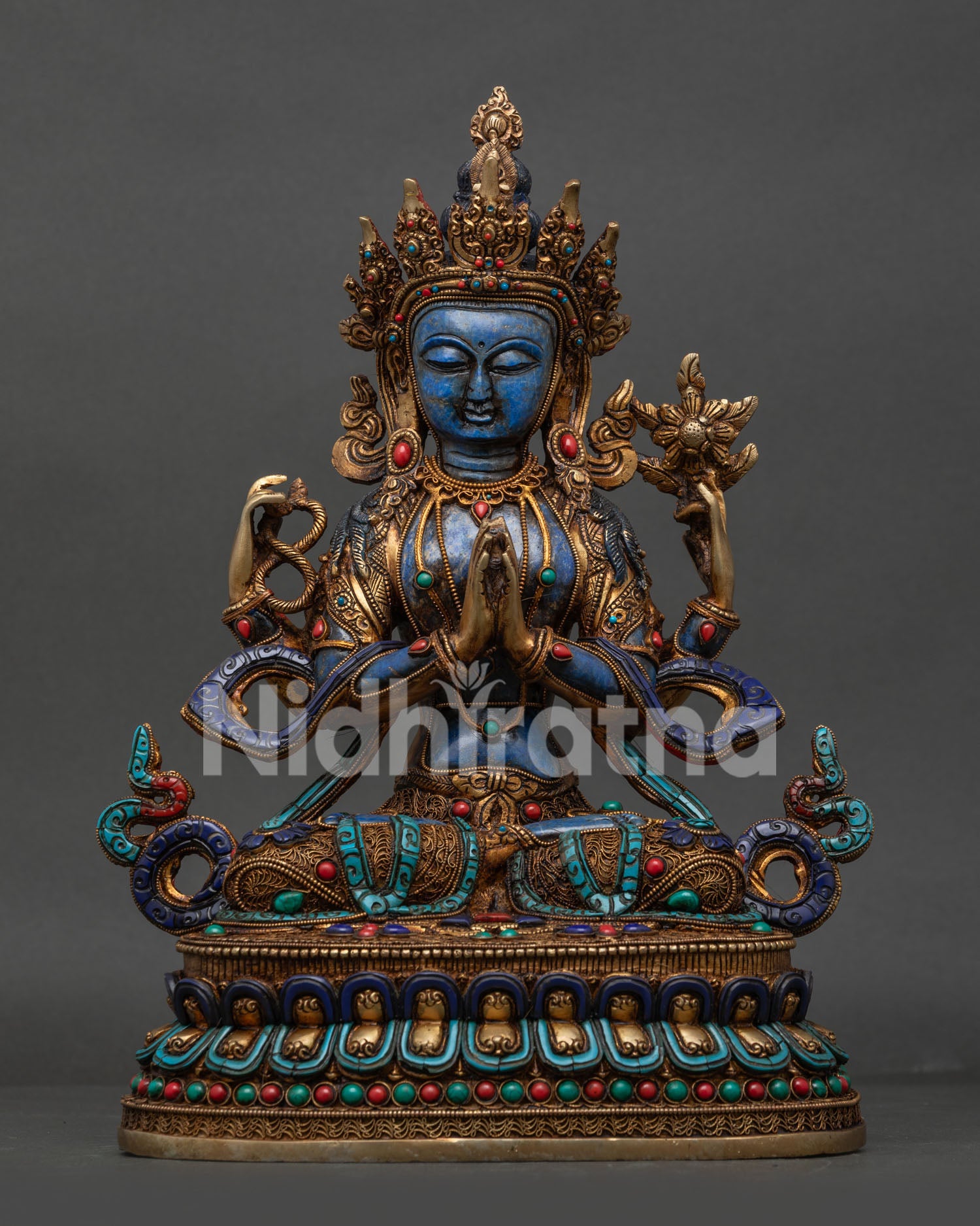 Handcrafted four armed Chenrezig statue with lapis lazuli body and gold gilded copper details