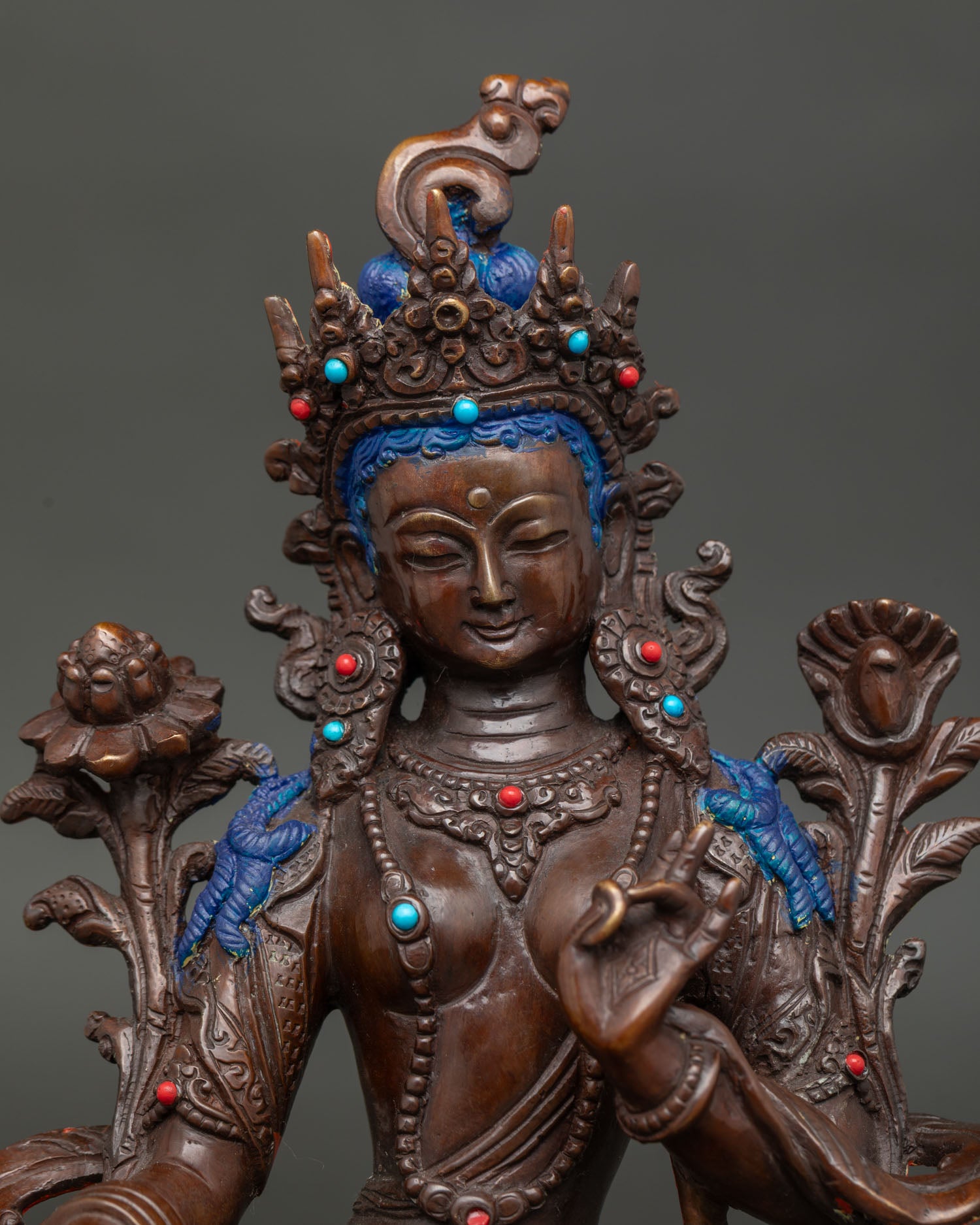 Handcrafted Green Tara Buddhist statue adorned with turquoise coral stones and five jeweled crown