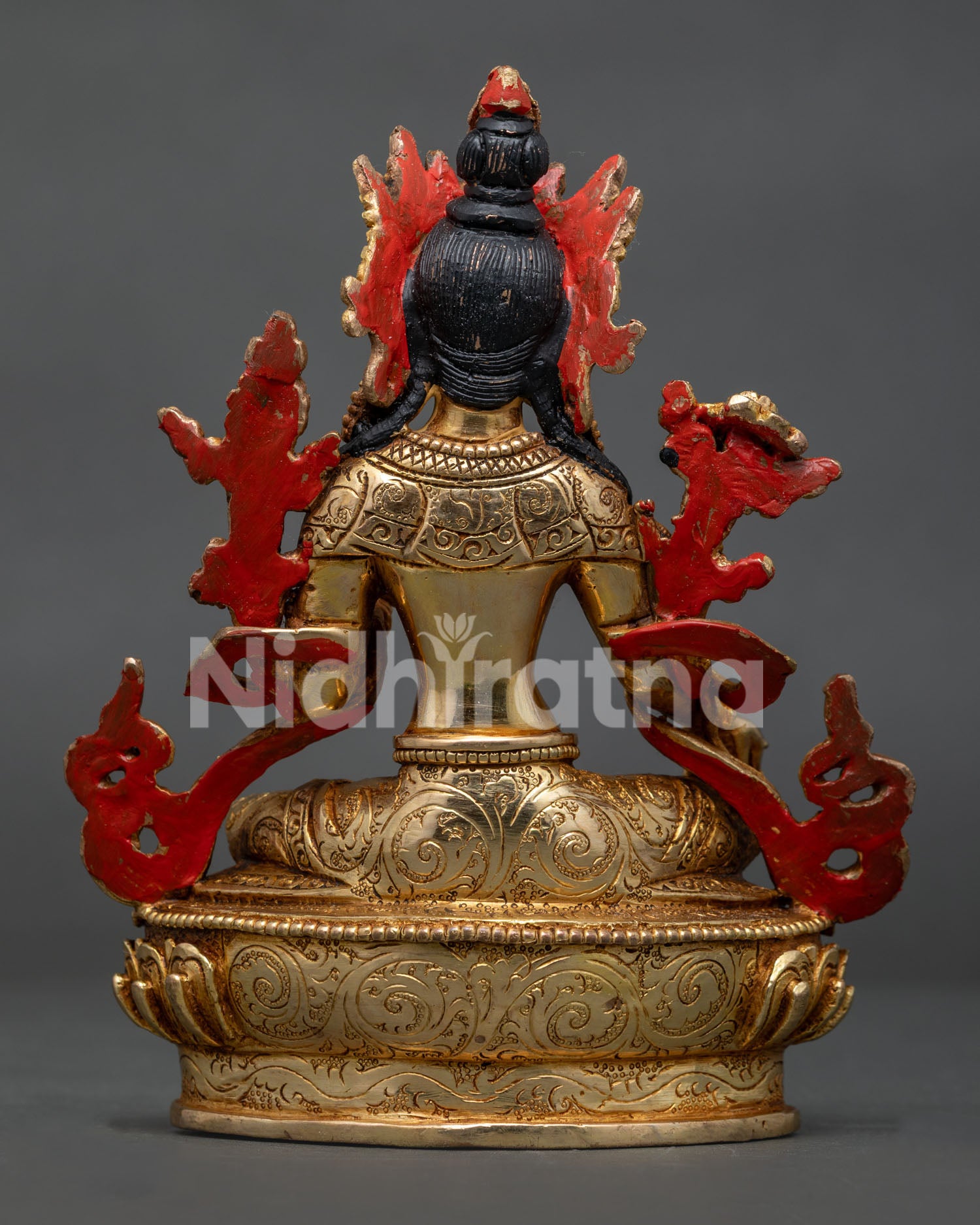 Handcrafted Green Tara sculpture with intricate floral motifs