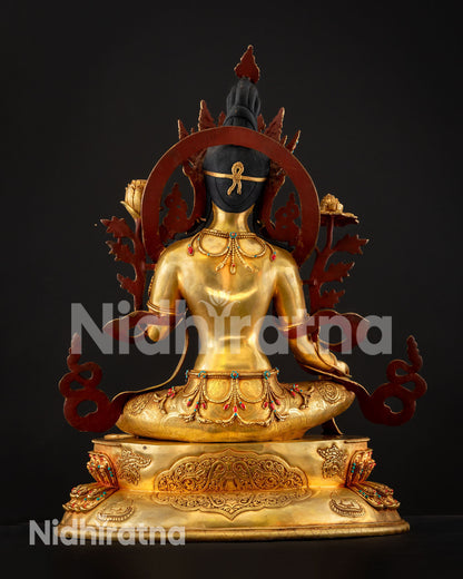 Handcrafted Green Tara statue displaying detailed metal craftsmanship polished copper surface and sacred Himalayan artistry