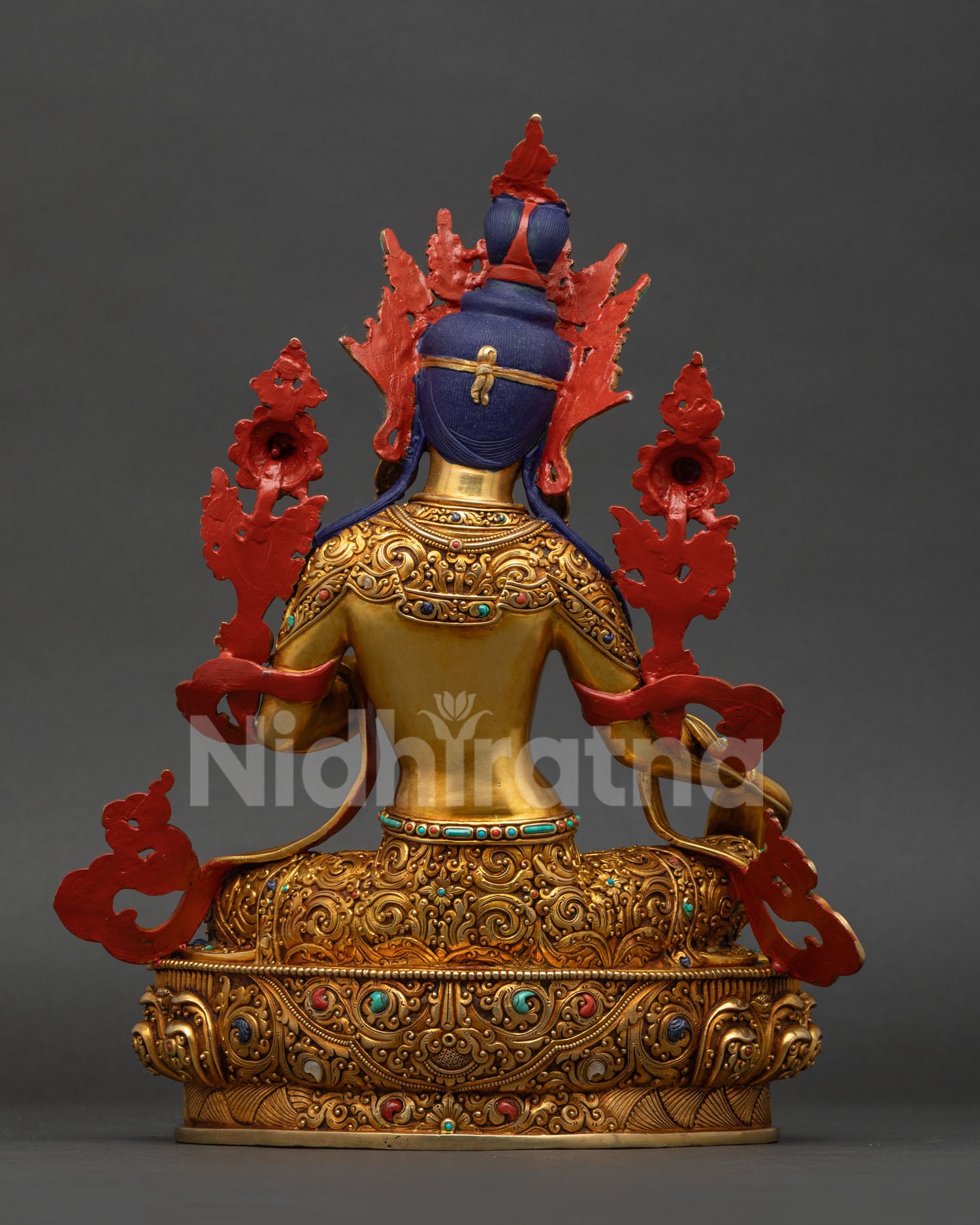 Handcrafted Green Tara statue from Nepal with detailed Nepalese metalwork, back view