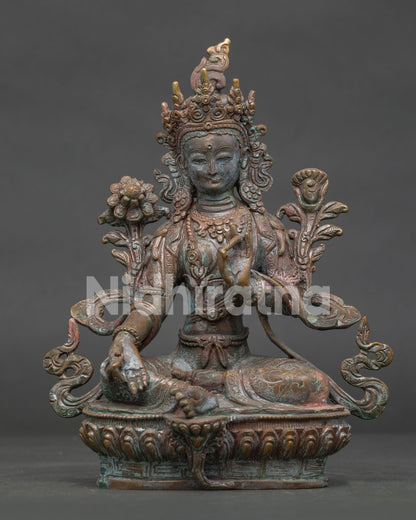 Handcrafted Green Tara statue from Patan Nepal with antique oxidized copper finish.
