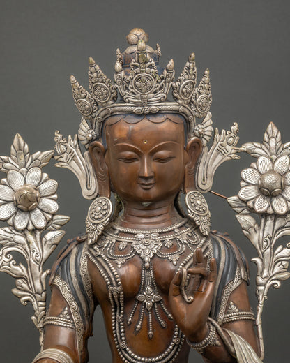 Handcrafted Green Tara Statue in oxidized copper with intricate silver ornaments and lotus throne