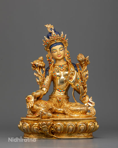 Handcrafted Green Tara statue made from copper with 24K gold fire gilding by Newari artisans in Patan, Nepal.