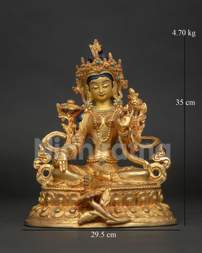 Handcrafted Green Tara statue with 24K gold painted face by Newari artisans from Patan Nepal.