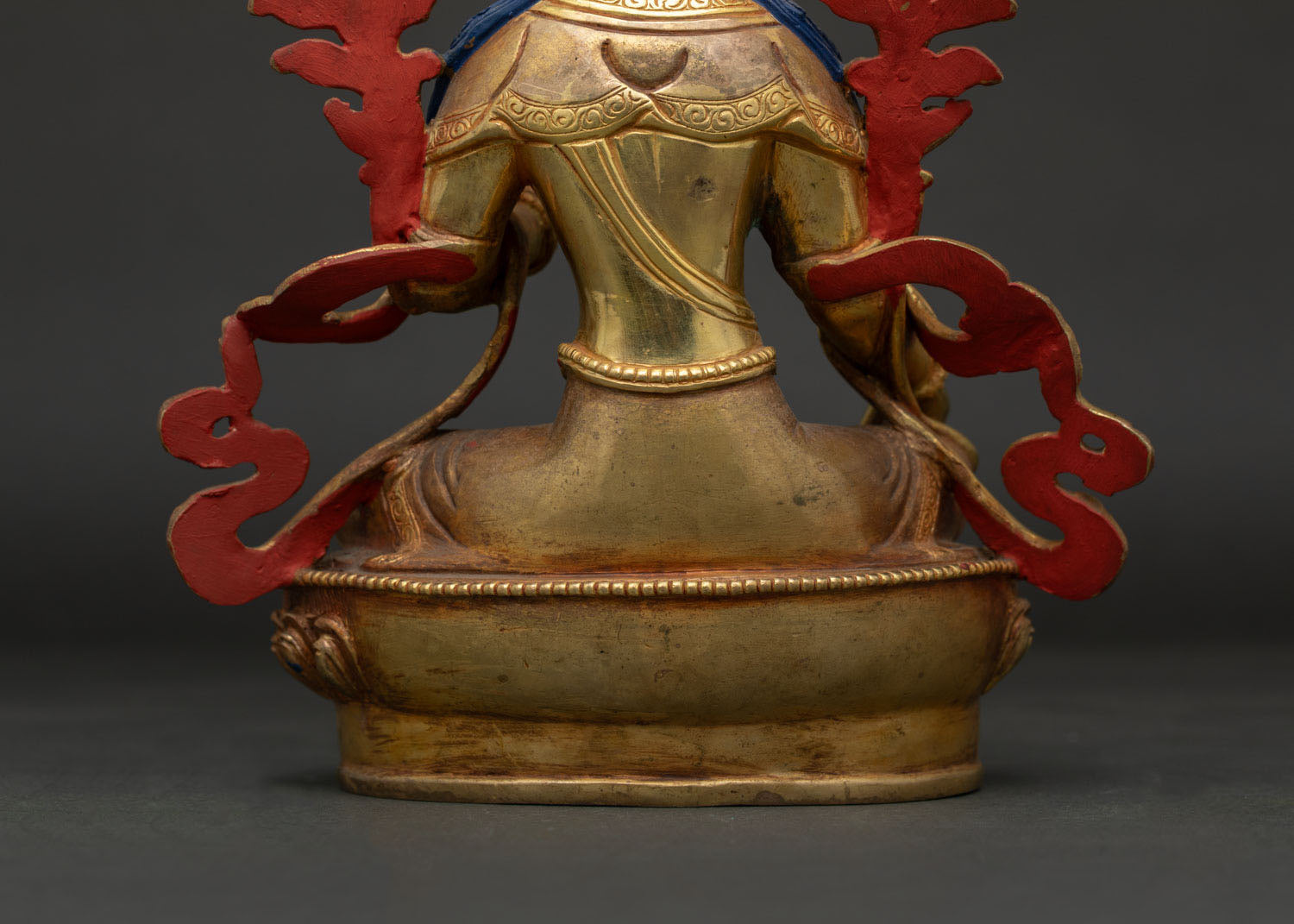 Handcrafted Green Tara Statue with Flowing Silk Garments.