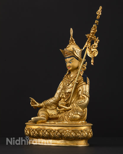 Handcrafted Guru Rinpoche Statue from Patan, Nepal with three dimensional carvings and lotus pedestal