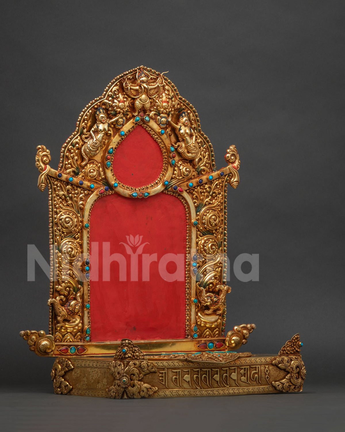 Handcrafted Himalayan shrine throne with Garuda, celestial figures, and repousse artwork