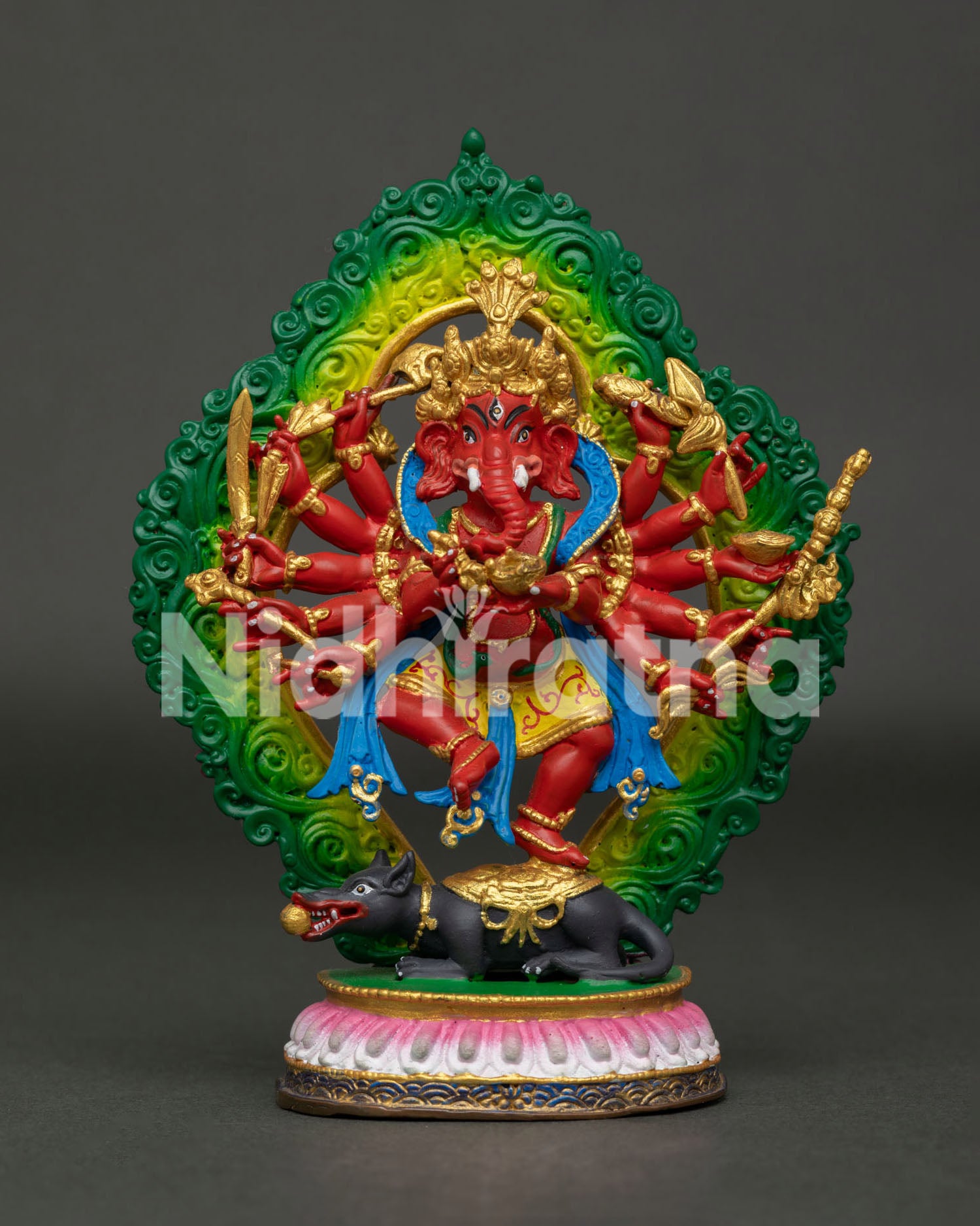 Handcrafted Lord Ganesh Statue with Twelve Arms Sacred Attributes and Decorative Halo.