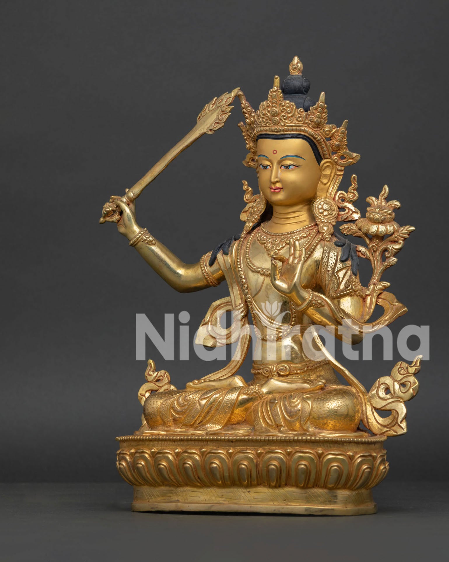 Handcrafted Manjushri Buddhist Statue featuring the flaming wisdom sword detail.