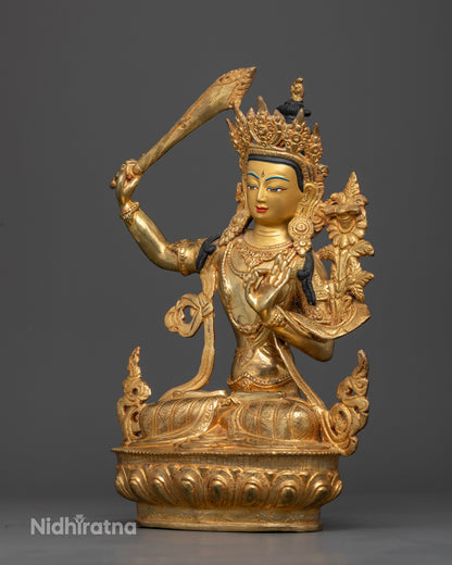 Handcrafted Manjushri Statue from Nepal with 24K gold painted face.