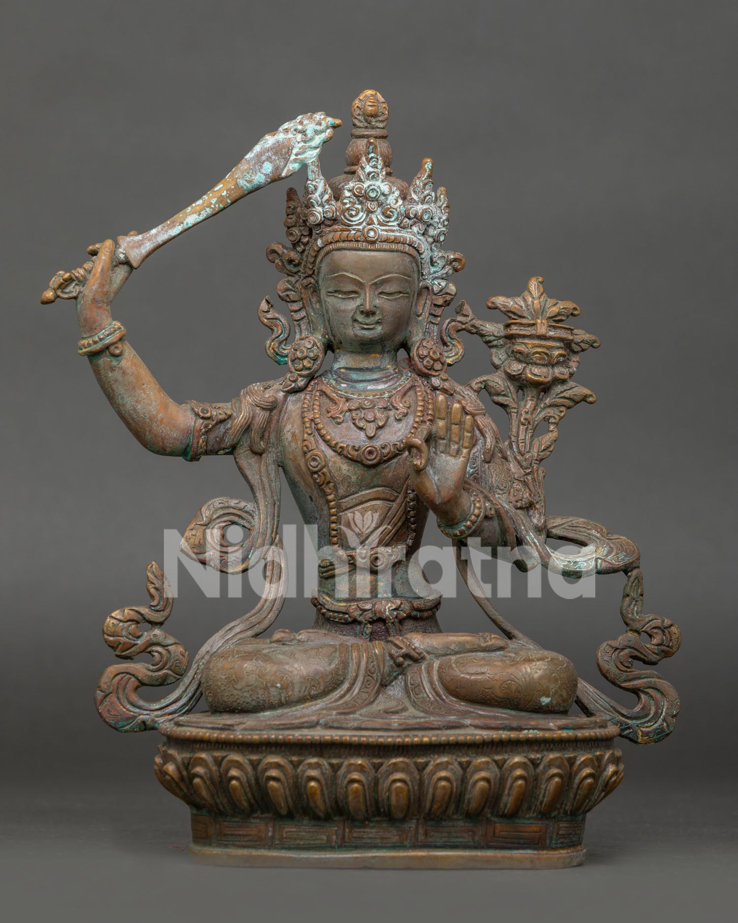 Handcrafted Manjushri Statue in Copper with Antique Oxidized Finish from Nepal.
