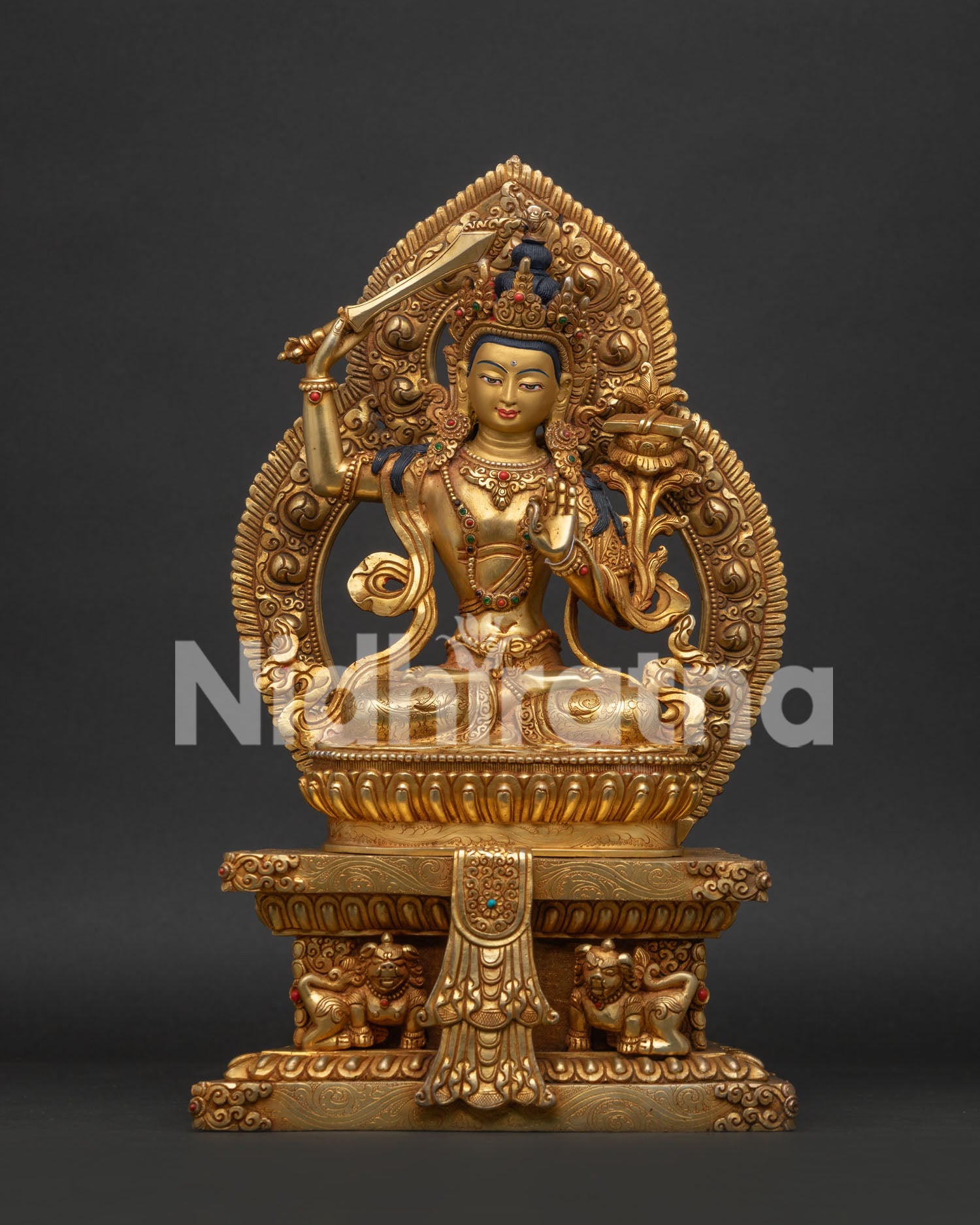 Handcrafted Manjushri Statue in Gold Fire Gilded Copper with Semi Precious Stones.