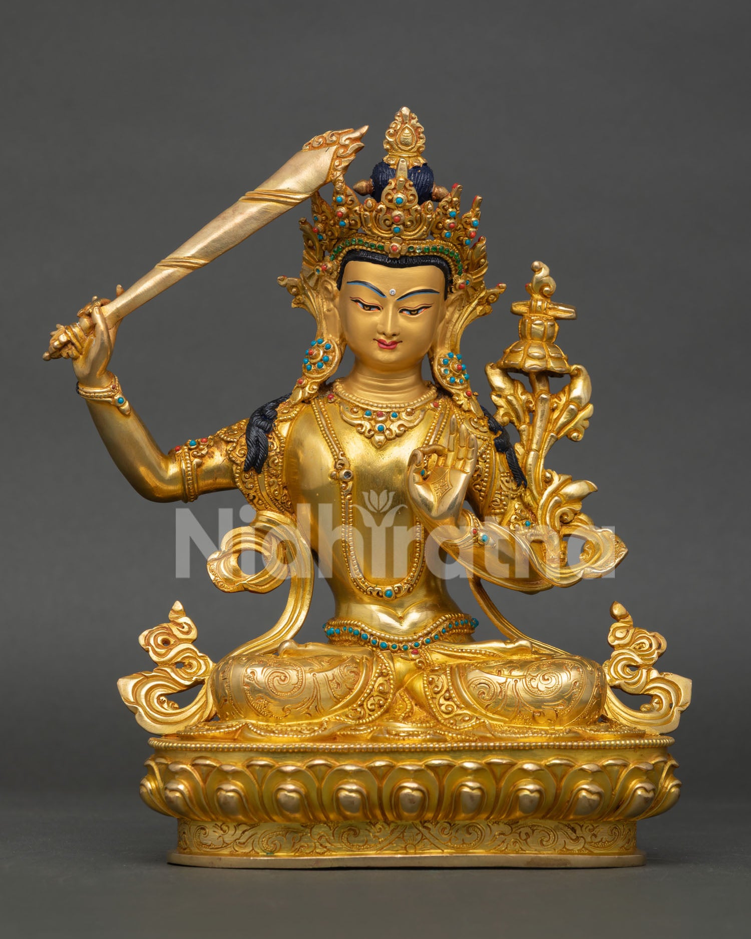 handcrafted manjushri statue with gold fire gilding and lotus throne front view