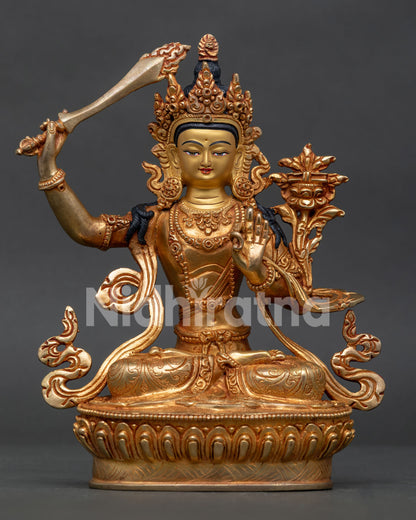 Handcrafted Manjushri statue with gold gilded copper body and lotus throne from Nepal