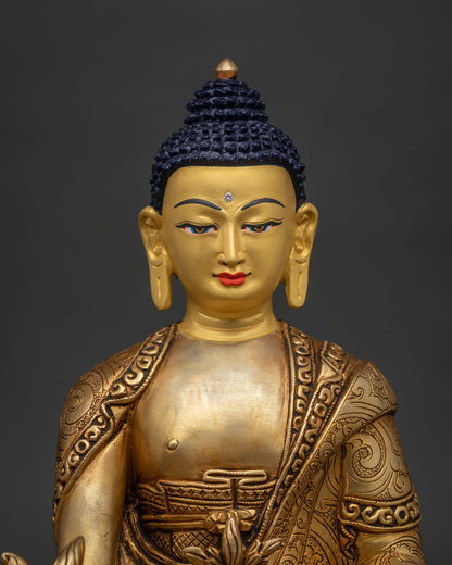 Handcrafted Medicine Buddha statue from Patan Nepal with 24K gold painted face.