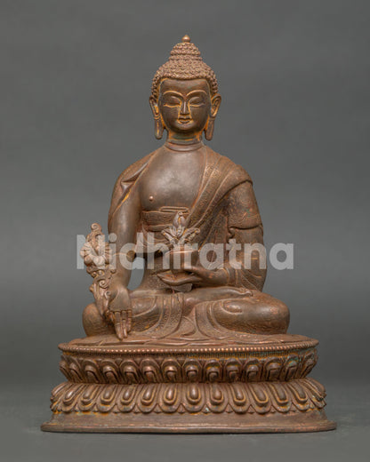 Handcrafted Medicine Buddha Statue in Copper with Antique Oxidized Finish from Nepal.
