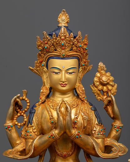 Handcrafted Nepalese Chenrezig Statue with gold painted face and semi precious stones