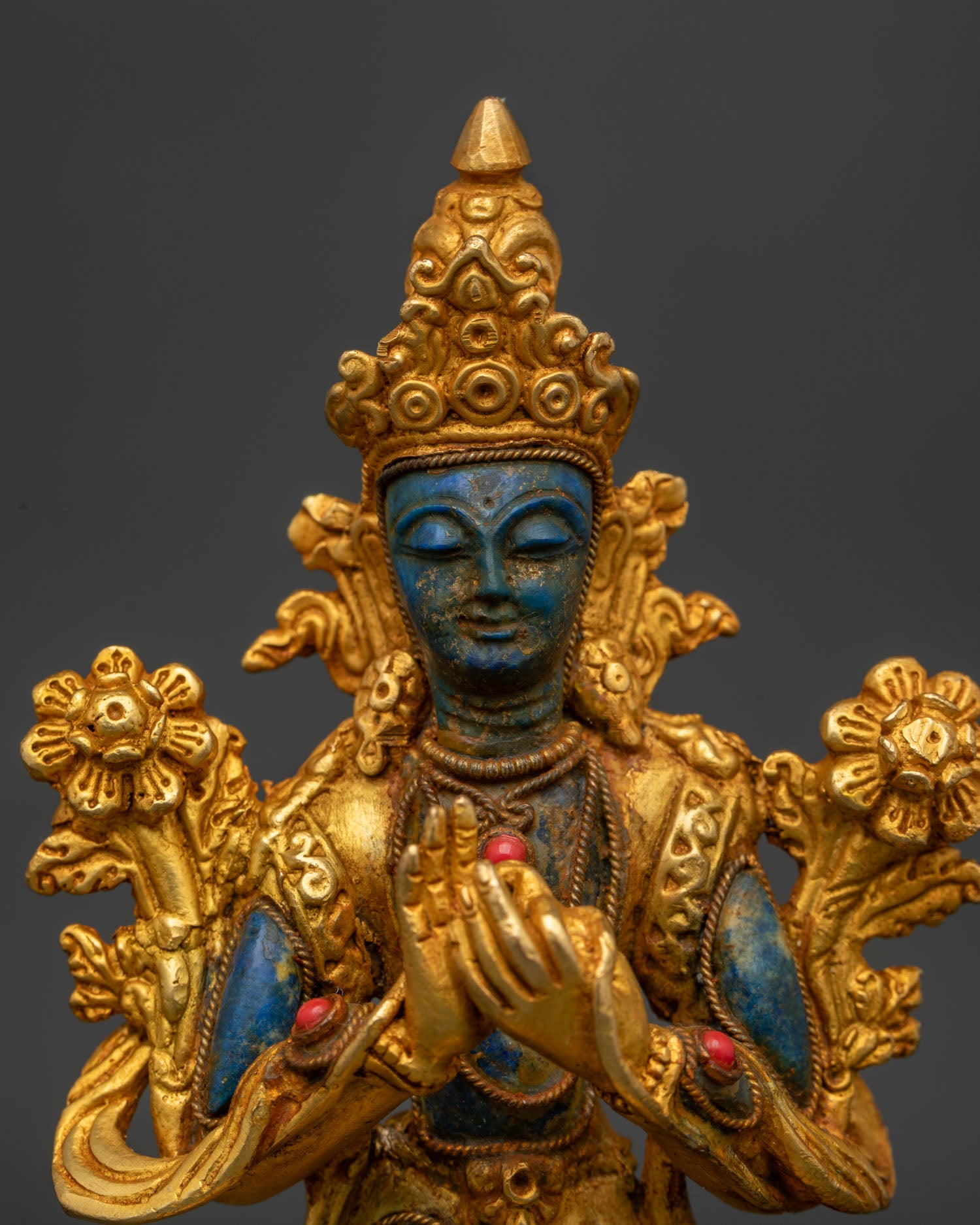 Handcrafted Nepalese Maitreya Buddha with intricate Newari metalwork and gemstone details