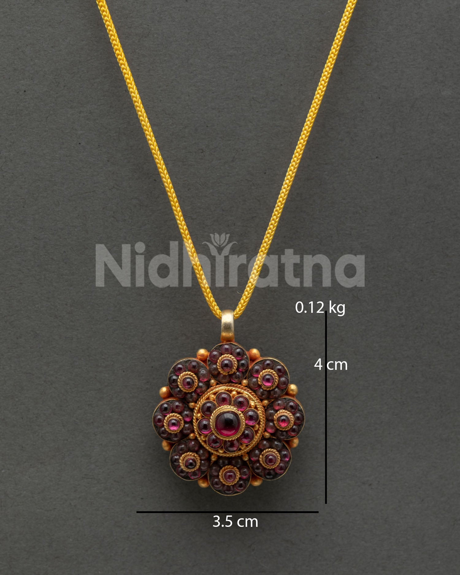 Handcrafted Nepalese rhodolite garnet flower locket with gold plated details