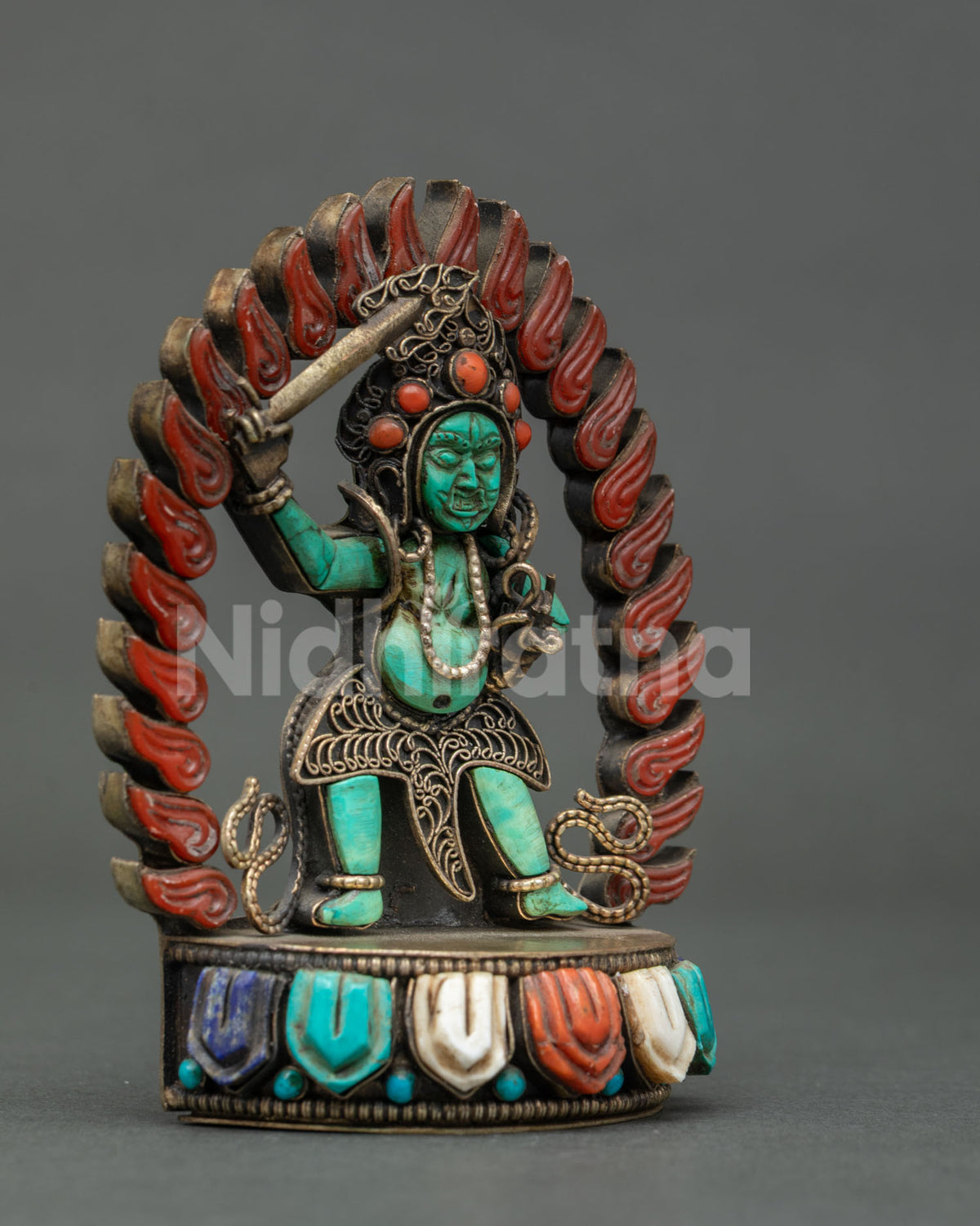 handcrafted newari sankata statue in turquoise and copper with gemstone lotus base side view