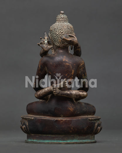 Handcrafted Samantabhadra with consort statue showing lotus throne and antique oxidized finish.