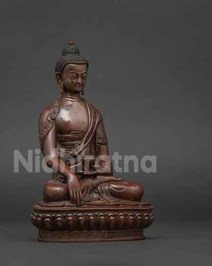 Handcrafted Shakyamuni Buddha statue showing Bhumisparsha Mudra and Patra bowl.